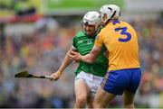 5 June 2022; Aaron Gillane of Limerick is tackled by Conor Cleary of Clare during the Munster GAA Hurling Senior Championship Final match between Limerick and Clare at Semple Stadium in Thurles, Tipperary. Photo by Ray McManus/Sportsfile