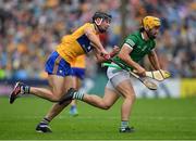 5 June 2022; Tom Morrisey of Limerick is tackled by Cathal Malone of Clare during the Munster GAA Hurling Senior Championship Final match between Limerick and Clare at Semple Stadium in Thurles, Tipperary. Photo by Ray McManus/Sportsfile