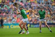 5 June 2022; Gearoid Hegarty of Limerick is hooked by Tony Kelly of Clare during the Munster GAA Hurling Senior Championship Final match between Limerick and Clare at Semple Stadium in Thurles, Tipperary. Photo by Ray McManus/Sportsfile