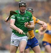 5 June 2022; Declan Hannon of Limerick is tackled by Tony Kelly of Clare during the Munster GAA Hurling Senior Championship Final match between Limerick and Clare at Semple Stadium in Thurles, Tipperary. Photo by Ray McManus/Sportsfile