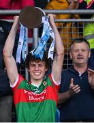 6 May 2022; Mayo captain Diarmuid Duffy lifts the cup after his side's victory in the Electric Ireland Connacht GAA Football Minor Championship Final match between Galway and Mayo at Hastings Insurance MacHale Park in Castlebar, Mayo. Photo by Piaras Ó Mídheach/Sportsfile