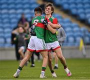 6 May 2022; Mayo players Diarmuid Duffy, right, and Liam Maloney celebrate after their side's victory in the Electric Ireland Connacht GAA Football Minor Championship Final match between Galway and Mayo at Hastings Insurance MacHale Park in Castlebar, Mayo. Photo by Piaras Ó Mídheach/Sportsfile