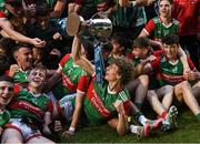 6 May 2022; Mayo captain Diarmuid Duffy celebrates with the cup alongside his teammates after their victory in the Electric Ireland Connacht GAA Football Minor Championship Final match between Galway and Mayo at Hastings Insurance MacHale Park in Castlebar, Mayo. Photo by Piaras Ó Mídheach/Sportsfile