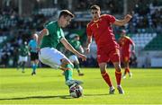 6 June 2022; Conor Noss of Republic of Ireland in action against Nikola Janjic of Montenegro during the UEFA European U21 Championship qualifying group F match between Republic of Ireland and Montenegro at Tallaght Stadium in Dublin. Photo by Seb Daly/Sportsfile