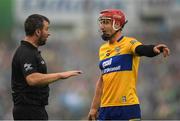 5 June 2022; John Conlon of Clare in conversation with linesman Referee Thomas Walsh during the Munster GAA Hurling Senior Championship Final match between Limerick and Clare at Semple Stadium in Thurles, Tipperary. Photo by Ray McManus/Sportsfile