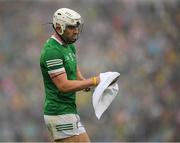 5 June 2022; Aaron Gillane of Limerick uses a towel to clean his hurley as he prepares to take a free during the Munster GAA Hurling Senior Championship Final match between Limerick and Clare at Semple Stadium in Thurles, Tipperary. Photo by Ray McManus/Sportsfile