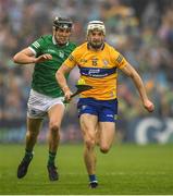 5 June 2022; Ryan Taylor of Clare in action against Conor Boylan of Limerick during the Munster GAA Hurling Senior Championship Final match between Limerick and Clare at Semple Stadium in Thurles, Tipperary. Photo by Ray McManus/Sportsfile