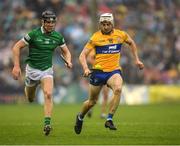 5 June 2022; Ryan Taylor of Clare in action against Conor Boylan of Limerick during the Munster GAA Hurling Senior Championship Final match between Limerick and Clare at Semple Stadium in Thurles, Tipperary. Photo by Ray McManus/Sportsfile