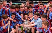 7 June 2022; Scoil Cronan SNS Brackenstown, Dublin, players celebrate with the Liam MacCarthy Cup after their victory against Gaelscoil Uí Eacain, Dublin, in the Corn Dublin Trophies final at the Allianz Cumann na mBunscol Finals in Croke Park, Dublin. Photo by Ben McShane/Sportsfile