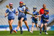 7 June 2022; Chloe Doyle of Scoil Mhuire Lucan, Dublin, in action against Hannah McCarthy of Scoil Thomais, Dublin, during the Corn INTO final at the Allianz Cumann na mBunscol Finals in Croke Park, Dublin. Over 2,800 schools and 200,000 students are set to compete in the primary schools competition this year with finals taking place across the country. Allianz and Cumann na mBunscol are also gifting 500 footballs, 200 hurleys and 200 sliotars to schools across the country to welcome Ukrainian students into our national games and local communities. Photo by Ben McShane/Sportsfile