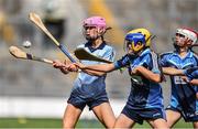 7 June 2022; Ciara Bresnan of Scoil Mhuire Lucan, Dublin, in action against Lucy Andrews, centre, and Emma Plunkett of Scoil Thomais, Dublin, during the Corn INTO final at the Allianz Cumann na mBunscol Finals in Croke Park, Dublin. Over 2,800 schools and 200,000 students are set to compete in the primary schools competition this year with finals taking place across the country. Allianz and Cumann na mBunscol are also gifting 500 footballs, 200 hurleys and 200 sliotars to schools across the country to welcome Ukrainian students into our national games and local communities. Photo by Ben McShane/Sportsfile