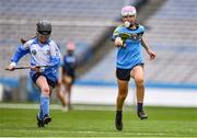 7 June 2022; Lara Dallaghan of Loreto GNA Dalkey, Dublin, in action against Róisín Nic Cárthaigh of Gaelscoile Inse Chor, Dublin, during the Corn Uí Mhaoilan final at the Allianz Cumann na mBunscol Finals in Croke Park, Dublin. Over 2,800 schools and 200,000 students are set to compete in the primary schools competition this year with finals taking place across the country. Allianz and Cumann na mBunscol are also gifting 500 footballs, 200 hurleys and 200 sliotars to schools across the country to welcome Ukrainian students into our national games and local communities. Photo by Ben McShane/Sportsfile