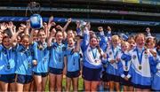 7 June 2022; Team captains Mia Ní Cholmáin of Gaelscoil Inse Chor, right, and Béibhinn O'Donnell of Loreto GNS Dalkey, Dublin lift the cup alonside their teammates after their drawn Corn Uí Mhaoilan final at the Allianz Cumann na mBunscol Finals in Croke Park, Dublin. Over 2,800 schools and 200,000 students are set to compete in the primary schools competition this year with finals taking place across the country. Allianz and Cumann na mBunscol are also gifting 500 footballs, 200 hurleys and 200 sliotars to schools across the country to welcome Ukrainian students into our national games and local communities. Photo by Ben McShane/Sportsfile