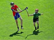 8 June 2022; Diarmuid O'Brien of Belgrove BNS is blocked down by Alex McMahon of Scoil Mhuire, Lucan, during the Corn Herald final at the Allianz Cumann na mBunscoil Hurling Finals in Croke Park, Dublin. Over 2,800 schools and 200,000 students are set to compete in the primary schools competition this year with finals taking place across the country. Allianz and Cumann na mBunscol are also gifting 500 footballs, 200 hurleys and 200 sliotars to schools across the country to welcome Ukrainian students into our national games and local communities. Photo by Piaras Ó Mídheach/Sportsfile