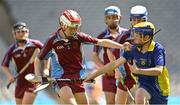 8 June 2022; Danny O'Donovan of St Fiachra's NS Beamount in action against Garbhan Burke of St Patrick's BNS Drumcondra in the Corn FODH final during the Allianz Cumann na mBunscoil Hurling Finals in Croke Park, Dublin. Over 2,800 schools and 200,000 students are set to compete in the primary schools competition this year with finals taking place across the country. Allianz and Cumann na mBunscol are also gifting 500 footballs, 200 hurleys and 200 sliotars to schools across the country to welcome Ukrainian students into our national games and local communities. Photo by Piaras Ó Mídheach/Sportsfile