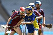 8 June 2022; Danny O'Donovan of St Fiachra's NS Beamount in action against Garbhan Burke of St Patrick's BNS Drumcondra in the Corn FODH final during the Allianz Cumann na mBunscoil Hurling Finals in Croke Park, Dublin. Over 2,800 schools and 200,000 students are set to compete in the primary schools competition this year with finals taking place across the country. Allianz and Cumann na mBunscol are also gifting 500 footballs, 200 hurleys and 200 sliotars to schools across the country to welcome Ukrainian students into our national games and local communities. Photo by Piaras Ó Mídheach/Sportsfile