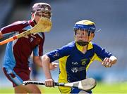 8 June 2022; Garbhan Burke of St Patrick's BNS Drumcondra in action against Sean Chatham of of St Fiachra's NS Beamount in the Corn FODH final during the Allianz Cumann na mBunscoil Hurling Finals in Croke Park, Dublin. Over 2,800 schools and 200,000 students are set to compete in the primary schools competition this year with finals taking place across the country. Allianz and Cumann na mBunscol are also gifting 500 footballs, 200 hurleys and 200 sliotars to schools across the country to welcome Ukrainian students into our national games and local communities. Photo by Piaras Ó Mídheach/Sportsfile