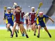 8 June 2022; Jamie O'Leary of St Fiachra's NS Beamount in action against Aaron Doyle of St Patrick's BNS Drumcondra in the Corn FODH final during the Allianz Cumann na mBunscoil Hurling Finals in Croke Park, Dublin. Over 2,800 schools and 200,000 students are set to compete in the primary schools competition this year with finals taking place across the country. Allianz and Cumann na mBunscol are also gifting 500 footballs, 200 hurleys and 200 sliotars to schools across the country to welcome Ukrainian students into our national games and local communities. Photo by Piaras Ó Mídheach/Sportsfile