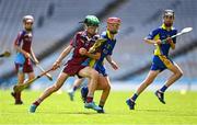 8 June 2022; Evan McLoughlin of St Fiachra's NS Beamount, left, in action against Aaron Doyle of St Patrick's BNS Drumcondra in the Corn FODH final during the Allianz Cumann na mBunscoil Hurling Finals in Croke Park, Dublin. Over 2,800 schools and 200,000 students are set to compete in the primary schools competition this year with finals taking place across the country. Allianz and Cumann na mBunscol are also gifting 500 footballs, 200 hurleys and 200 sliotars to schools across the country to welcome Ukrainian students into our national games and local communities. Photo by Piaras Ó Mídheach/Sportsfile  Photo by Piaras Ó Mídheach/Sportsfile