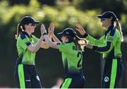 3 June; Sophie MacMahon of Ireland, left, celebrates with Celeste Raack, centre, and Gaby Lewis after catching out Anneke Bosch of South Africa during the Women's T20 International match between Ireland and South Africa at Pembroke Cricket Club in Dublin. Photo by Sam Barnes/Sportsfile