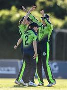 3 June; Sophie MacMahon of Ireland, left, celebrates with Celeste Raack, centre, and Gaby Lewis after catching out Anneke Bosch of South Africa during the Women's T20 International match between Ireland and South Africa at Pembroke Cricket Club in Dublin. Photo by Sam Barnes/Sportsfile