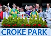 8 June 2022; Members of the Ryder family present the Tom Ryder cup to the captains of Scoil Oilibheir, Coolmine, Senan Ó Broin, left, and Riain De Búrca after their side's victory over Holy Trinity SNS in the Corn Tom Ryder final at the Allianz Cumann na mBunscoil Hurling Finals in Croke Park, Dublin. Over 2,800 schools and 200,000 students are set to compete in the primary schools competition this year with finals taking place across the country. Allianz and Cumann na mBunscol are also gifting 500 footballs, 200 hurleys and 200 sliotars to schools across the country to welcome Ukrainian students into our national games and local communities. Photo by Piaras Ó Mídheach/Sportsfile