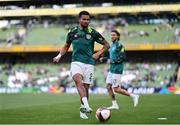 8 June 2022; Cyrus Christie of Republic of Ireland warms up before the UEFA Nations League B group 1 match between Republic of Ireland and Ukraine at Aviva Stadium in Dublin. Photo by Ben McShane/Sportsfile