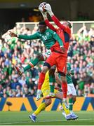 8 June 2022; Chiedozie Ogbene of Republic of Ireland in action against Ukraine goalkeeper Andriy Lunin during the UEFA Nations League B group 1 match between Republic of Ireland and Ukraine at Aviva Stadium in Dublin. Photo by Stephen McCarthy/Sportsfile