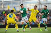 8 June 2022; Jason Knight of Republic of Ireland in action against Mykola Shaparenko, left, and Serhiy Sydorchuk of Ukraine during the UEFA Nations League B group 1 match between Republic of Ireland and Ukraine at Aviva Stadium in Dublin. Photo by Stephen McCarthy/Sportsfile
