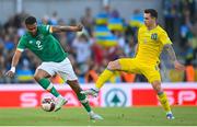 8 June 2022; Cyrus Christie of Republic of Ireland in action against Mykola Shaparenko of Ukraine during the UEFA Nations League B group 1 match between Republic of Ireland and Ukraine at Aviva Stadium in Dublin. Photo by Stephen McCarthy/Sportsfile