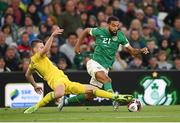 8 June 2022; CJ Hamilton of Republic of Ireland is tackled by Oleksandr Syrota of Ukraine during the UEFA Nations League B group 1 match between Republic of Ireland and Ukraine at Aviva Stadium in Dublin. Photo by Stephen McCarthy/Sportsfile