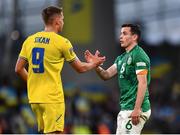 8 June 2022; Danylo Sikan of Ukraine and Josh Cullen of Republic of Ireland embrace after the UEFA Nations League B group 1 match between Republic of Ireland and Ukraine at Aviva Stadium in Dublin. Photo by Ben McShane/Sportsfile