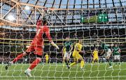 8 June 2022; Shane Duffy of Republic of Ireland has a header on goal saved by Ukraine goalkeeper Andriy Lunin during the UEFA Nations League B group 1 match between Republic of Ireland and Ukraine at Aviva Stadium in Dublin. Photo by Seb Daly/Sportsfile