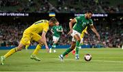 8 June 2022; CJ Hamilton of Republic of Ireland in action against Oleksandr Syrota of Ukraine during the UEFA Nations League B group 1 match between Republic of Ireland and Ukraine at Aviva Stadium in Dublin. Photo by Seb Daly/Sportsfile