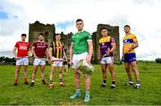 9 June 2022; Mike Casey of Limerick with the Liam MacCarthy Cup alongside, from left, Robert Downey of Cork, Gearóid McInerney of Galway, Richie Reid of Kilkenny, Lee Chin of Wexford and Cathal Malone of Clare at Loughmore Castle at the GAA Hurling All-Ireland Senior Championship Series national launch in Tipperary. Photo by Brendan Moran/Sportsfile