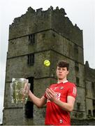 9 June 2022; Robert Downey of Cork poses for a portrait with the Liam MacCarthy Cup at Loughmore Castle at the GAA Hurling All-Ireland Senior Championship Series national launch in Tipperary. Photo by Brendan Moran/Sportsfile
