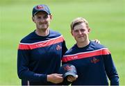 10 June 2022; Northern Knights captain Neil Adair, left, presents debutant Cade Carmichael with his cap before the Cricket Ireland Inter-Provincial Trophy match between North West Warriors and Northern Knights at Bready Cricket Club in Bready, Tyrone. Photo by Ramsey Cardy/Sportsfile
