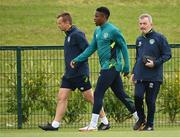 10 June 2022; Chiedozie Ogbene with Danny Miller, chartered physiotherapist, left, and team doctor Alan Byrne, right, during a Republic of Ireland training session at the FAI National Training Centre in Abbotstown, Dublin. Photo by Stephen McCarthy/Sportsfile