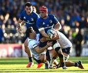 10 June 2022; Josh van der Flier of Leinster is tackled by Chris Smith, left, and Elrigh Louw of Vodacom Bulls during the United Rugby Championship Semi-Final match between Leinster and Vodacom Bulls at the RDS Arena in Dublin. Photo by David Fitzgerald/Sportsfile