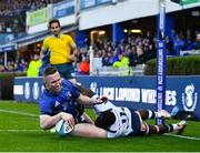 10 June 2022; Rory O'Loughlin of Leinster scores his side's third try despite Madosh Tambwe of Vodacom Bulls during the United Rugby Championship Semi-Final match between Leinster and Vodacom Bulls at the RDS Arena in Dublin. Photo by David Fitzgerald/Sportsfile