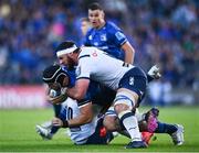 10 June 2022; Caelan Doris of Leinster is tackled by Marcell Coetzee, top, and Chris Smith of Vodacom Bulls during the United Rugby Championship Semi-Final match between Leinster and Vodacom Bulls at the RDS Arena in Dublin. Photo by David Fitzgerald/Sportsfile