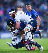 10 June 2022; Caelan Doris of Leinster is tackled by Marcell Coetzee, top, and Chris Smith of Vodacom Bulls during the United Rugby Championship Semi-Final match between Leinster and Vodacom Bulls at the RDS Arena in Dublin. Photo by David Fitzgerald/Sportsfile