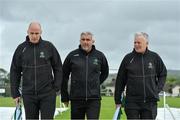 11 June 2022; Umpire Roly Black, left, with match referee George Brolly and umpire Mark Hawthorne during the pitch inspection in advance of the Cricket Ireland Inter-Provincial Trophy match between Leinster Lightning and Northern Knights at Bready Cricket Club in Tyrone. Photo by George Tewkesbury/Sportsfile