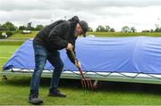 11 June 2022; Bready Cricket Club grounds man, Trevor Hamilton prepering the ground for the first umpire inspection during the Cricket Ireland Inter-Provincial Trophy match between Leinster Lightning and Northern Knights at Bready Cricket Club in Tyrone. Photo by George Tewkesbury/Sportsfile