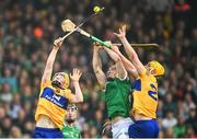 5 June 2022; Clare players Shane Meehan, left, and Mark Rodgers in action against Richie English of Limerick during the Munster GAA Hurling Senior Championship Final match between Limerick and Clare at FBD Semple Stadium in Thurles, Tipperary. Photo by Piaras Ó Mídheach/Sportsfile