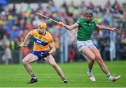 5 June 2022; David Fitzgerald of Clare in action against Gearóid Hegarty of Limerick during the Munster GAA Hurling Senior Championship Final match between Limerick and Clare at FBD Semple Stadium in Thurles, Tipperary. Photo by Piaras Ó Mídheach/Sportsfile