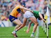 5 June 2022; Gearóid Hegarty of Limerick passes the ball under pressure from David McInerney of Clare during the Munster GAA Hurling Senior Championship Final match between Limerick and Clare at FBD Semple Stadium in Thurles, Tipperary. Photo by Piaras Ó Mídheach/Sportsfile