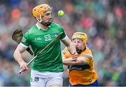 5 June 2022; Richie English of Limerick in action against Shane Meehan of Clare during the Munster GAA Hurling Senior Championship Final match between Limerick and Clare at FBD Semple Stadium in Thurles, Tipperary. Photo by Piaras Ó Mídheach/Sportsfile