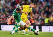 8 June 2022; Denys Popov of Ukraine is tackled by Josh Cullen of Republic of Ireland during the UEFA Nations League B group 1 match between Republic of Ireland and Ukraine at Aviva Stadium in Dublin. Photo by Ben McShane/Sportsfile