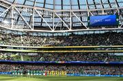 8 June 2022; Players of both side's stand for a minutes applause before the UEFA Nations League B group 1 match between Republic of Ireland and Ukraine at Aviva Stadium in Dublin. Photo by Ben McShane/Sportsfile